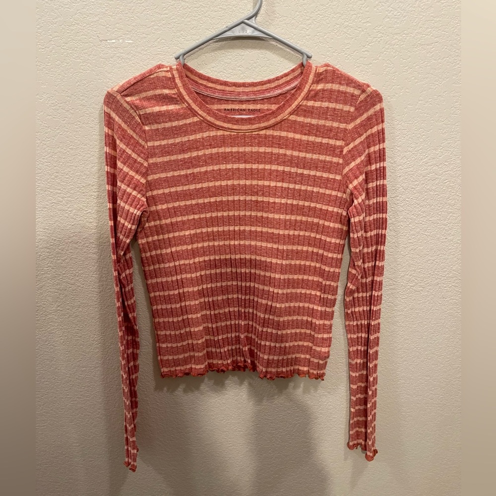 Woman’s brand new American Eagle knit shirt size small petite.